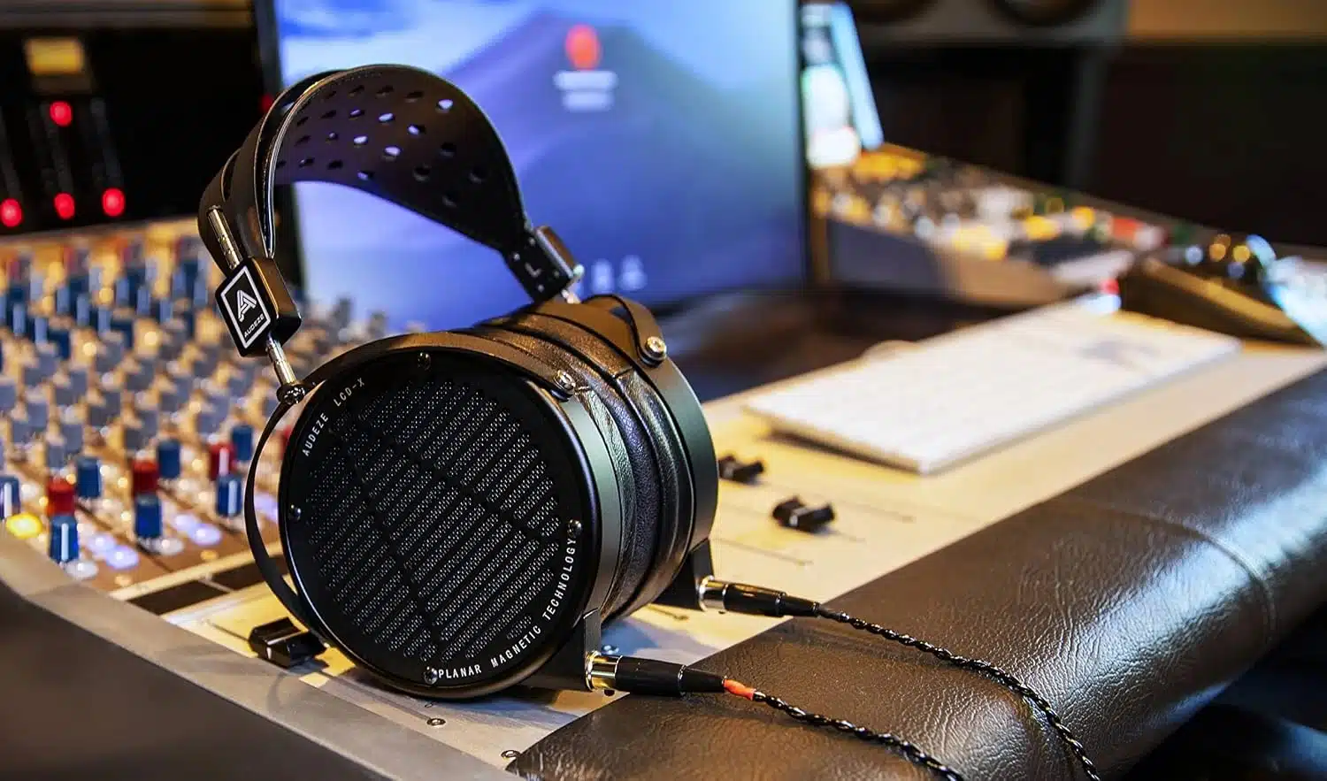 Audeze LCD-X planar magnetic headphones on a studio mixing desk