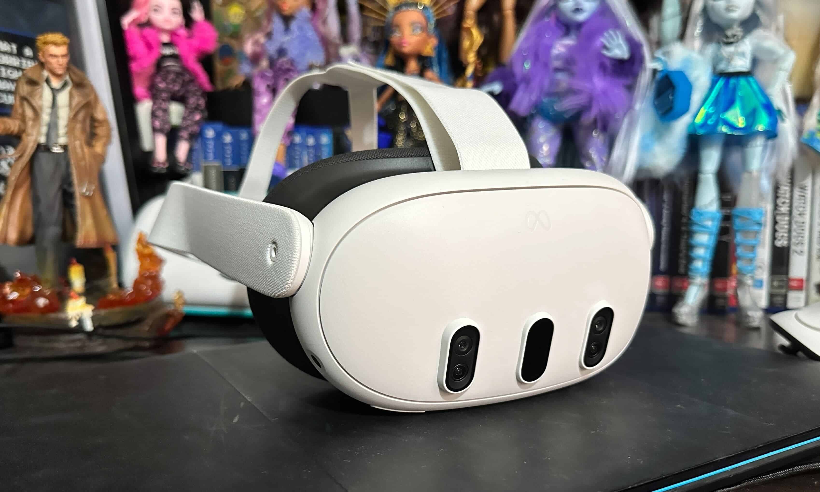 A white Meta Quest 3 virtual-reality headset on a desk