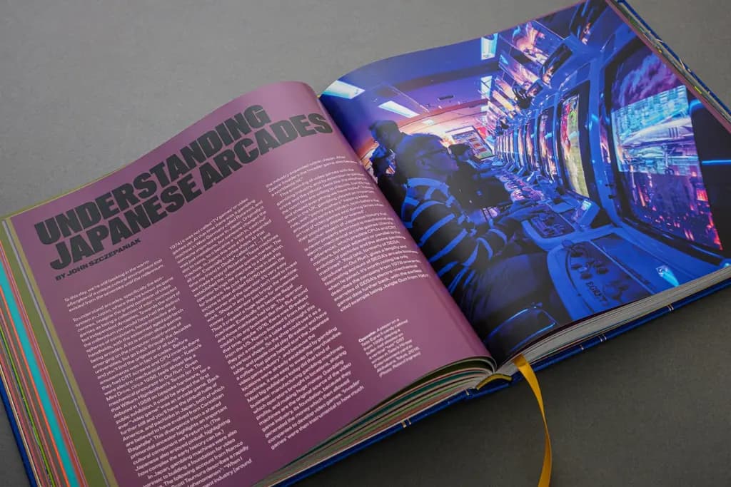 The Arcade 1971–1999 open to its feature on Japanese arcades