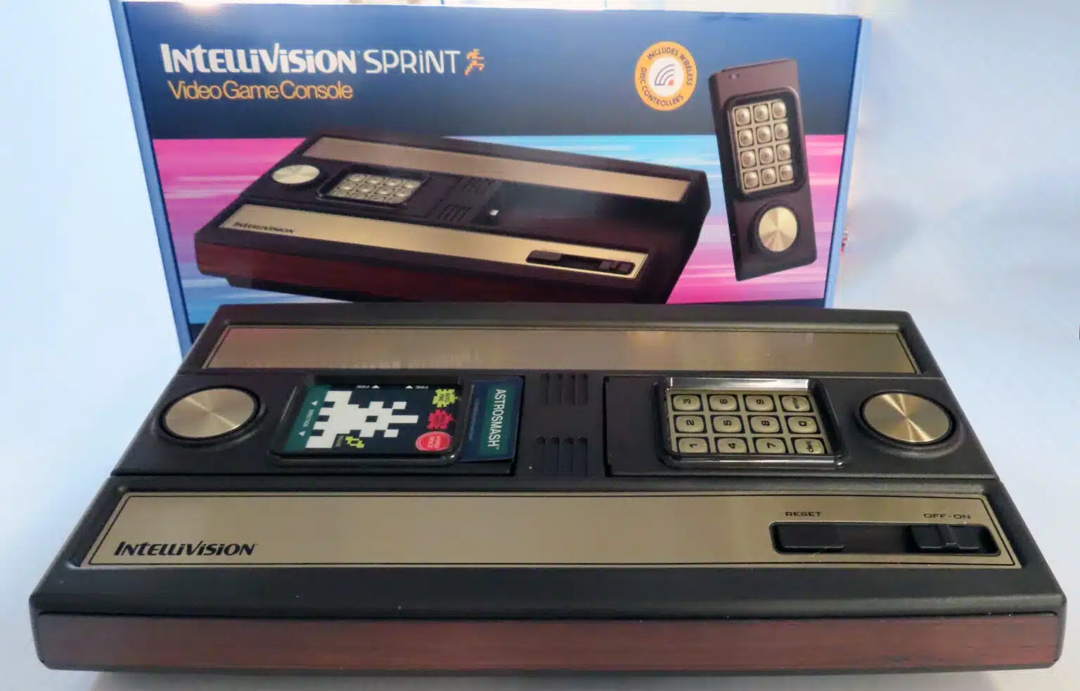 Intellivision Sprint console and controllers in front of its retail box