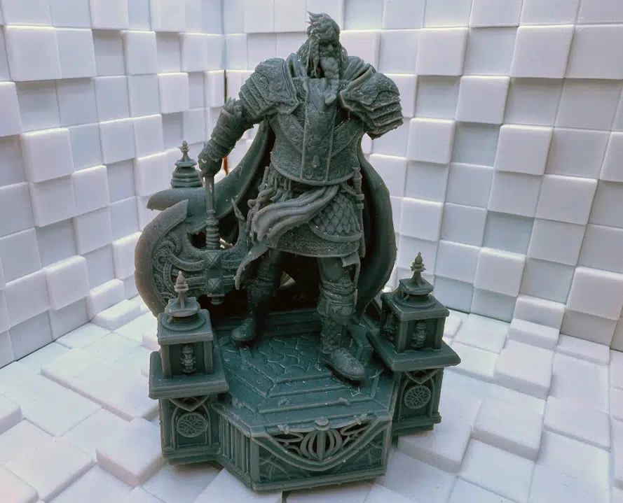 A 3D printed model of Godfrey from Elden Ring shortly after curing.