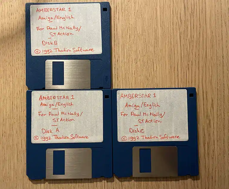 A stack of Amberstar disks sent to Amiga Action