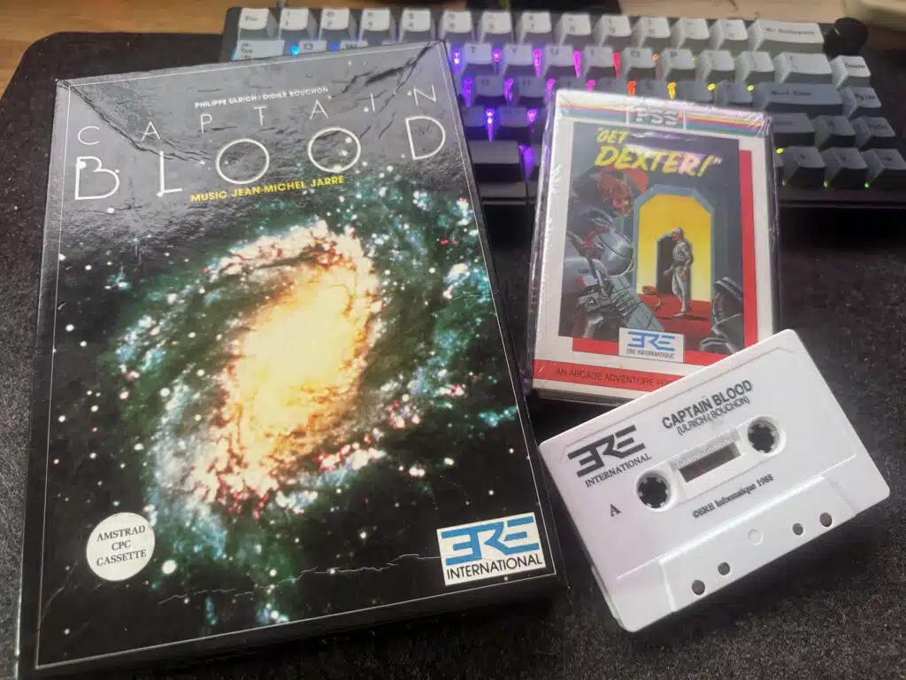 Captain Blood and Get Dexter game boxes and a Captain Blood cassette from Ére Informatique