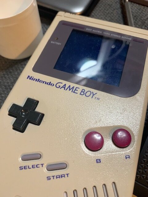 A yellowed original Nintendo Game Boy
