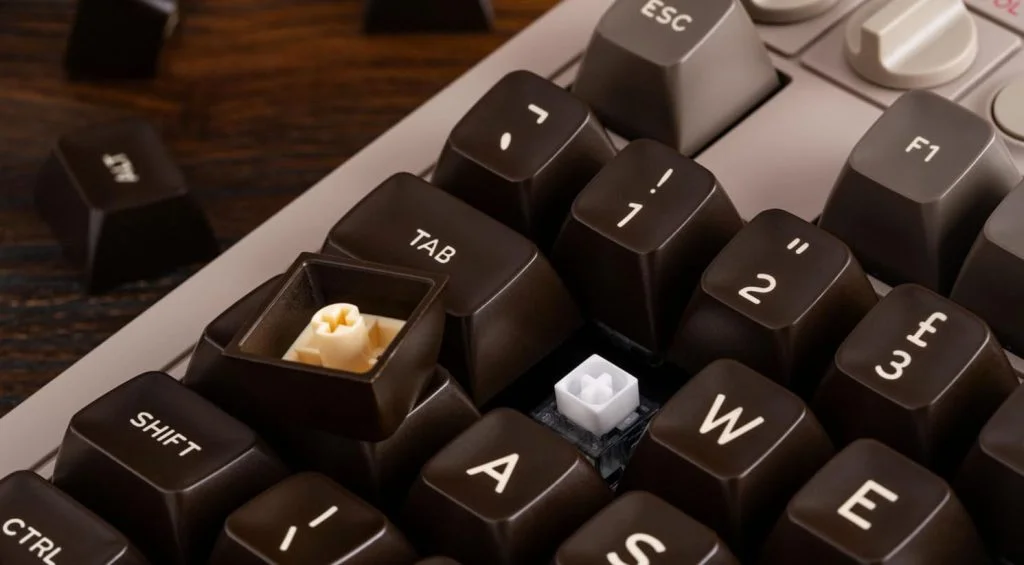 Close-up of the brown C64-style keycaps and Kailh switches on the 8BitDo keyboard