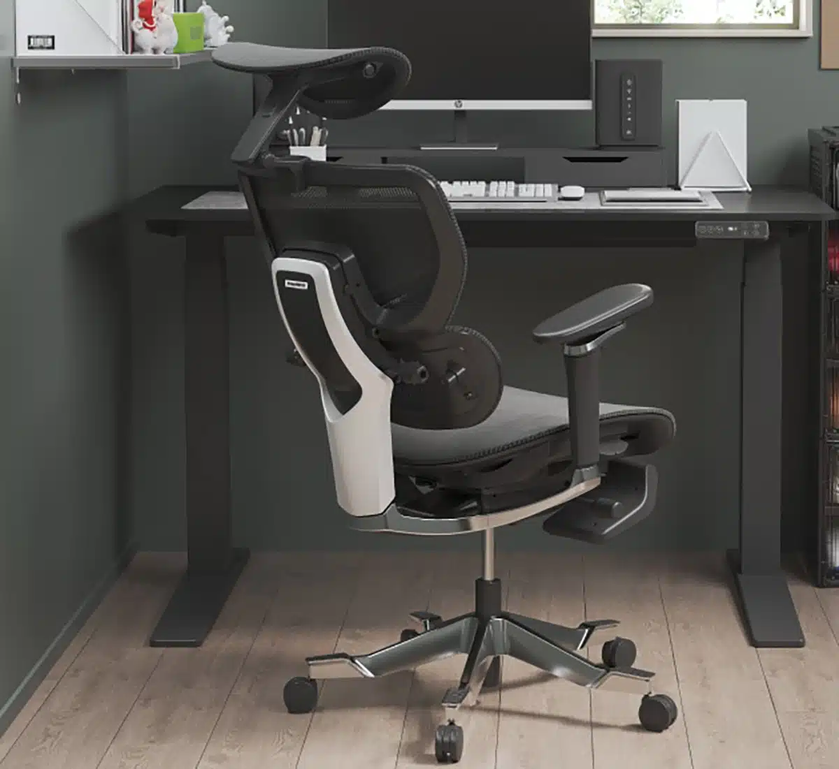 FlexiSpot C7 Morpher ergonomic chair in front of a computer desk